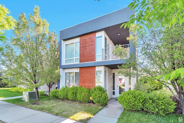 11611 S Alexandria W, South Jordan, UT 84009 - modern home featuring a balcony and stucco siding