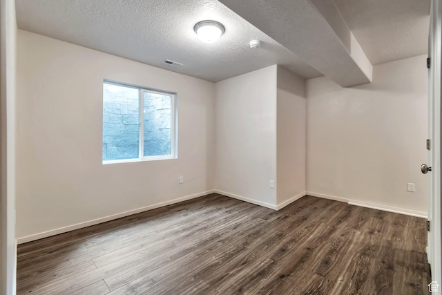 11611 S Alexandria W, South Jordan, UT 84009 - interior space featuring baseboards, dark wood finished floors, a textured ceiling, and visible vents