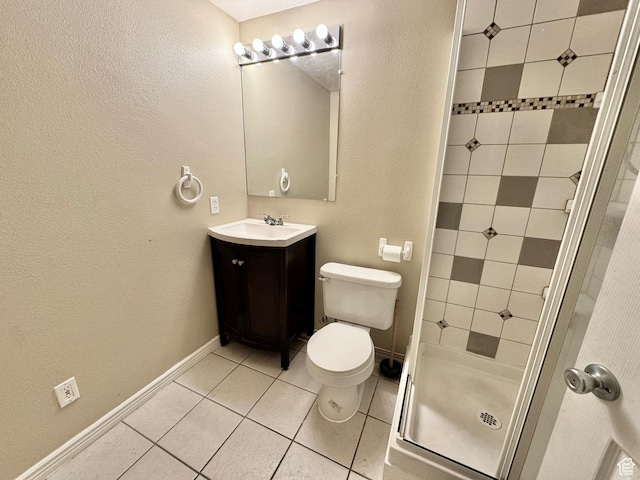 863 S 1520 E, Spanish Fork, UT 84660 - bathroom featuring a stall shower, vanity, tile patterned floors, baseboards, and toilet