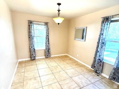 863 S 1520 E, Spanish Fork, UT 84660 - spare room with baseboards, visible vents, and light tile patterned floors