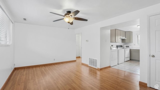 434 S 700 W Unit 4, Provo, UT 84601 - unfurnished living room featuring a healthy amount of sunlight, ceiling fan, light wood-style flooring, and visible vents