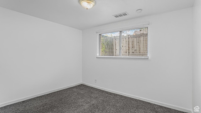 434 S 700 W Unit 4, Provo, UT 84601 - spare room with baseboards, dark carpet, and visible vents
