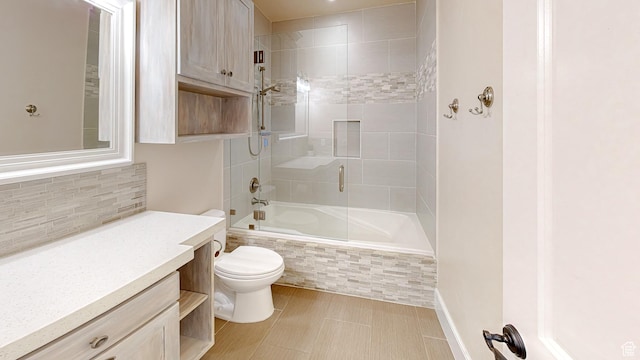 997 W 675 S, Mapleton, UT 84664 - bathroom with toilet, tiled shower / bath, tasteful backsplash, and vanity