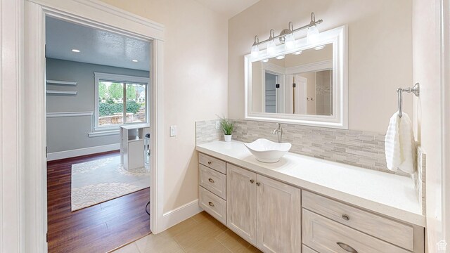 997 W 675 S, Mapleton, UT 84664 - bathroom featuring tasteful backsplash, vanity, and baseboards