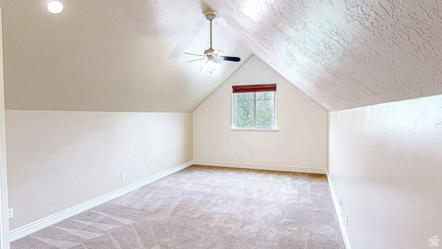 997 W 675 S, Mapleton, UT 84664 - additional living space with carpet floors, baseboards, vaulted ceiling, and a ceiling fan