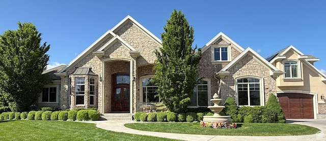 997 W 675 S, Mapleton, UT 84664 - french country inspired facade featuring stone siding, a front yard, and concrete driveway