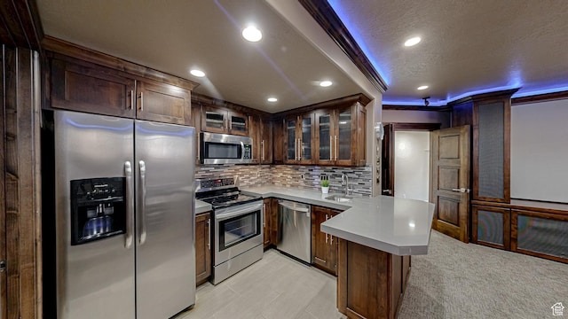 997 W 675 S, Mapleton, UT 84664 - kitchen featuring appliances with stainless steel finishes, a peninsula, a sink, recessed lighting, and backsplash
