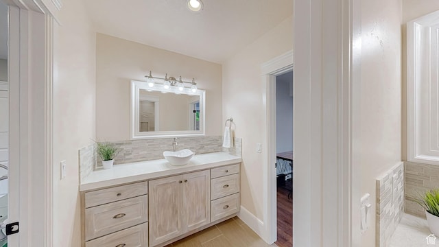 997 W 675 S, Mapleton, UT 84664 - bathroom featuring backsplash, vanity, and wood finished floors