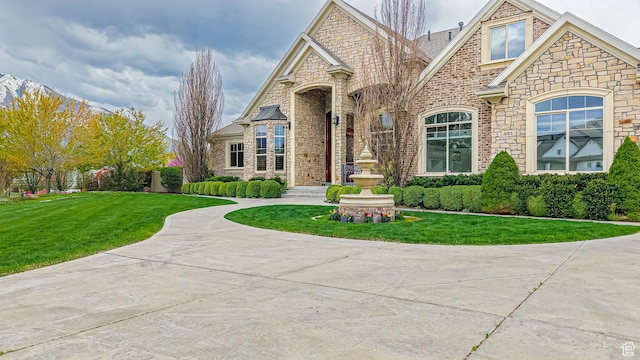 997 W 675 S, Mapleton, UT 84664 - view of front facade featuring stone siding and a front yard