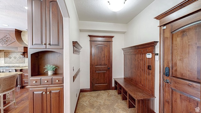 997 W 675 S, Mapleton, UT 84664 - mudroom with a textured ceiling and baseboards