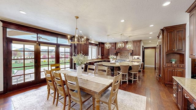 997 W 675 S, Mapleton, UT 84664 - dining area featuring wood-type flooring, recessed lighting, french doors, a chandelier, and a textured ceiling