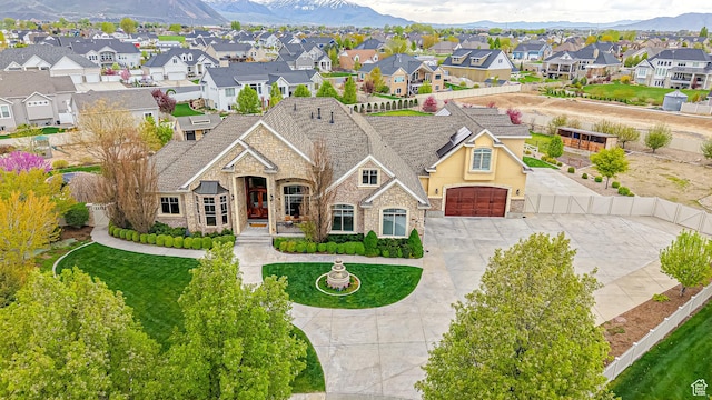 997 W 675 S, Mapleton, UT 84664 - view of front facade with stone siding, a mountain view, a residential view, a garage, and driveway
