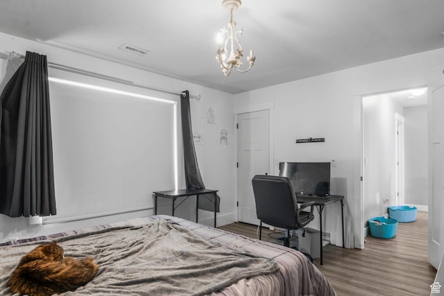 1635 W 700 S, Lehi, UT 84043 - bedroom featuring visible vents, baseboards, wood finished floors, and a notable chandelier