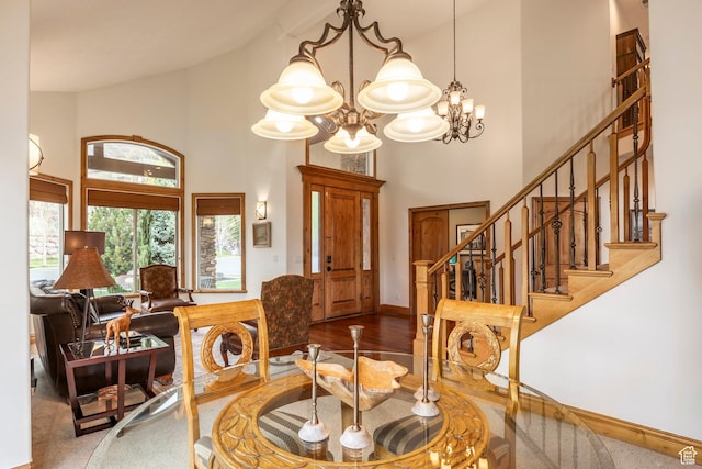 1263 E Wild Maple Ct, Draper, UT 84020 - dining space featuring an inviting chandelier, high vaulted ceiling, baseboards, and stairway