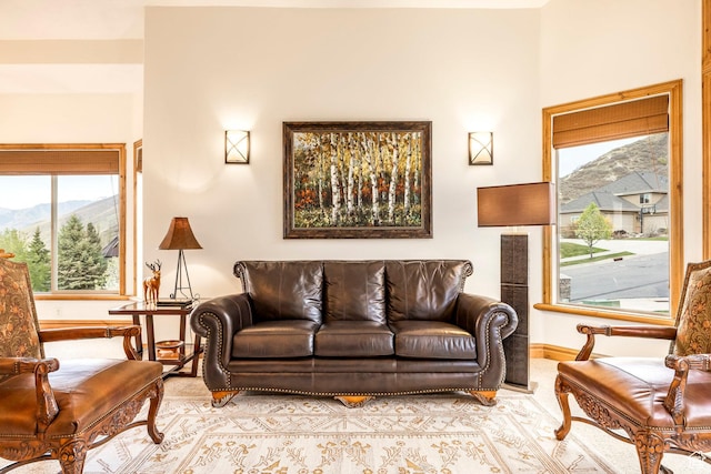 1263 E Wild Maple Ct, Draper, UT 84020 - living room featuring baseboards, a mountain view, and a wealth of natural light