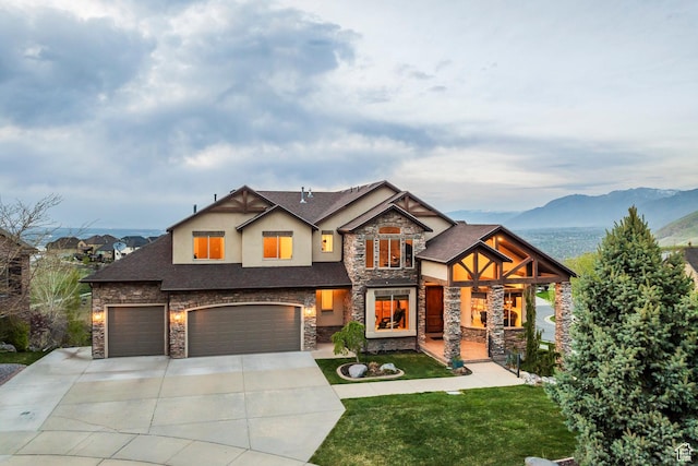 1263 E Wild Maple Ct, Draper, UT 84020 - craftsman inspired home featuring a garage, a front lawn, stone siding, stucco siding, and driveway