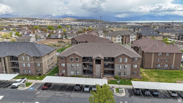 birds eye view of property with a residential view