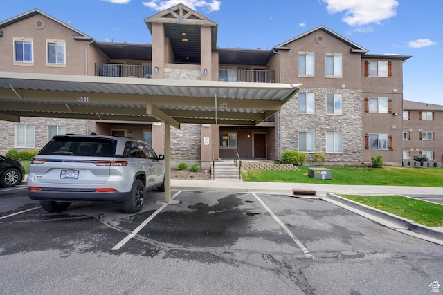 3569 E Rock Creek Rd Unit G2, Eagle Mountain, UT 84005 - view of covered parking lot