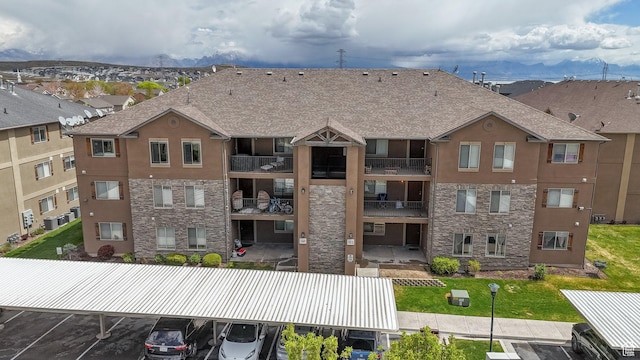3569 E Rock Creek Rd Unit G2, Eagle Mountain, UT 84005 - view of property with uncovered parking