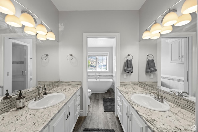 566 N Bella Vista Dr E, Orem, UT 84097 - full bathroom with a sink, wood finished floors, and two vanities