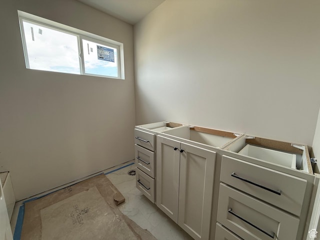 4097 N Ophir Dr, Eagle Mountain, UT 84005 - laundry area with light marble finish flooring