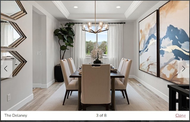 382 W 1225 N Unit 2, Harrisville, UT 84404 - dining area featuring crown molding, light wood finished floors, a tray ceiling, and a notable chandelier