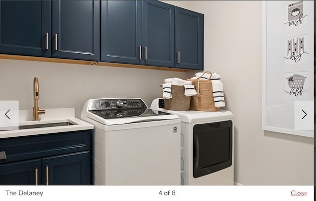 382 W 1225 N Unit 2, Harrisville, UT 84404 - washroom with separate washer and dryer, a sink, and cabinet space