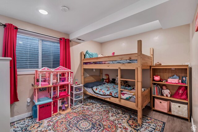 239 Country Club Dr, Stansbury Park, UT 84074 - bedroom with wood finished floors and baseboards