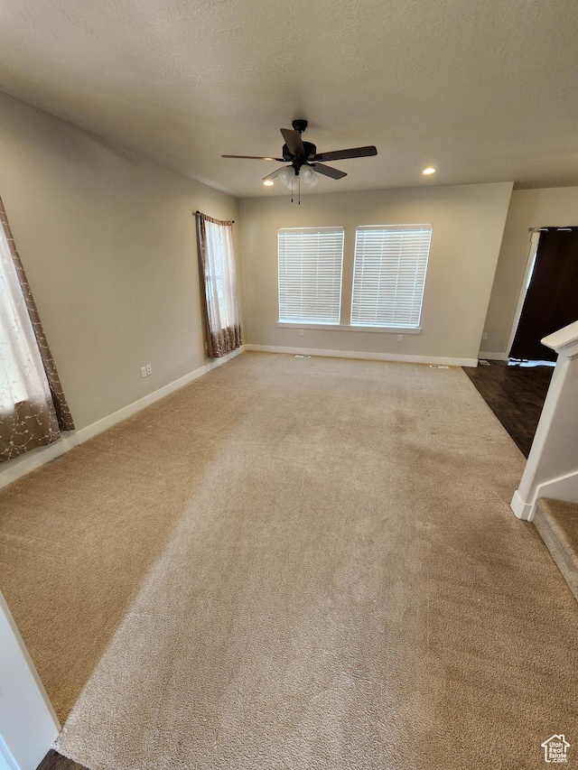 113 N Granite Park Dr, Saratoga Springs, UT 84045 - unfurnished living room featuring carpet flooring, a ceiling fan, baseboards, and recessed lighting