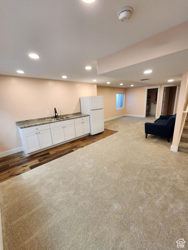 113 N Granite Park Dr, Saratoga Springs, UT 84045 - finished basement featuring freestanding refrigerator, baseboards, wet bar, carpet floors, and recessed lighting