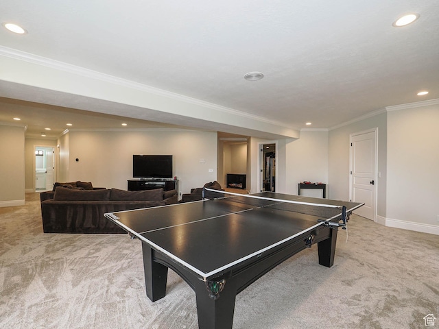 game room featuring baseboards, ornamental molding, light carpet, and recessed lighting
