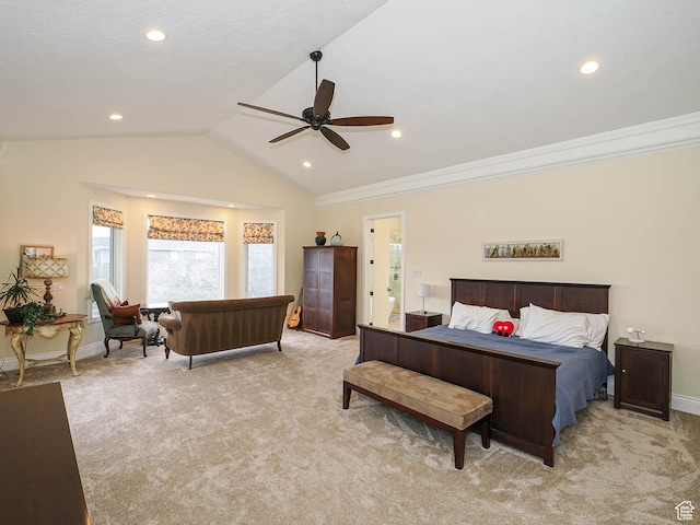 bedroom featuring crown molding, lofted ceiling, light carpet, and multiple windows