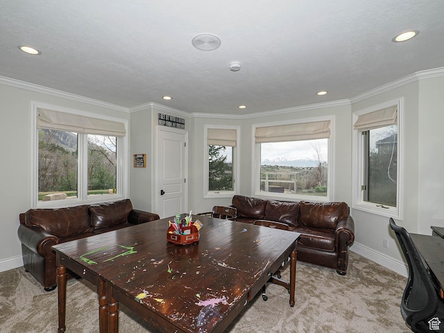living room with recessed lighting, baseboards, light colored carpet, and plenty of natural light