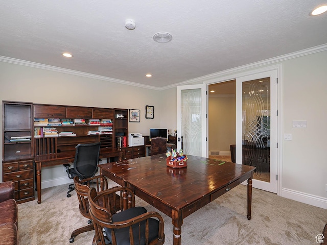 home office with crown molding, recessed lighting, and light carpet