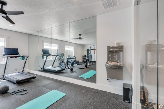 654 N 200 E, American Fork, UT 84003 - workout area featuring baseboards, a ceiling fan, a textured ceiling, and visible vents