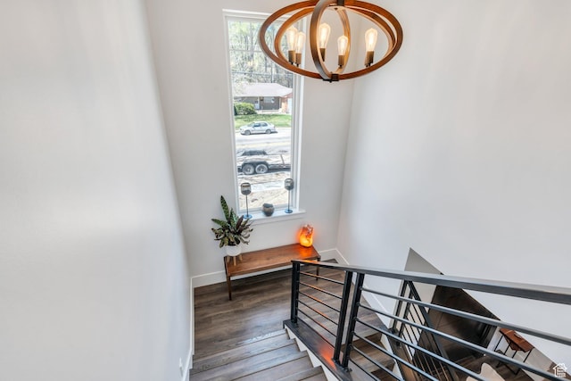 654 N 200 E, American Fork, UT 84003 - staircase featuring baseboards, wood finished floors, and a notable chandelier