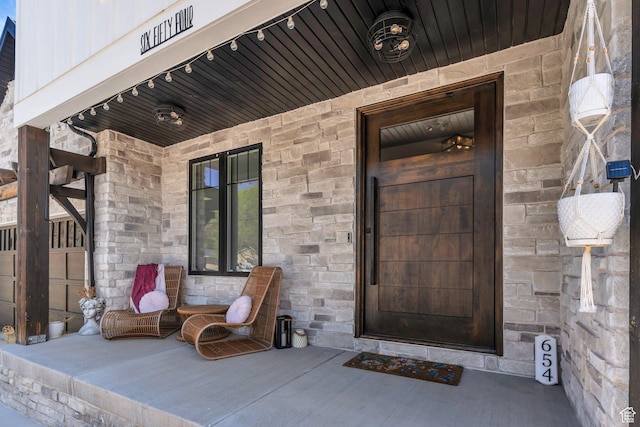654 N 200 E, American Fork, UT 84003 - property entrance with a porch and stone siding