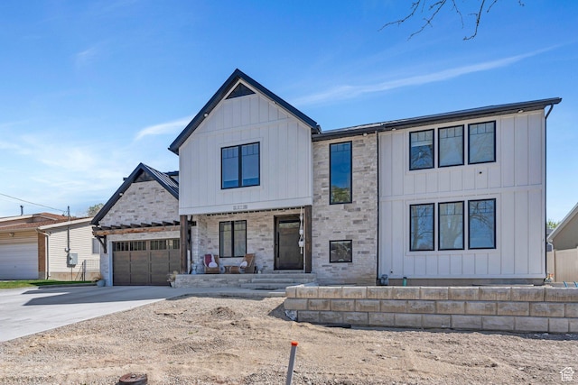 654 N 200 E, American Fork, UT 84003 - modern farmhouse featuring an attached garage, board and batten siding, driveway, and covered porch