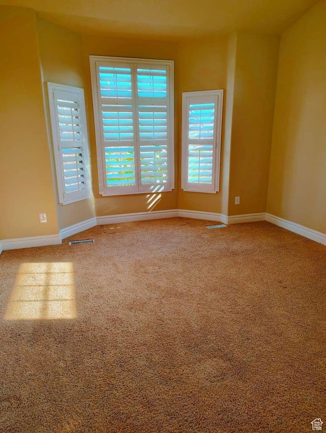 3641 W Canyon Lands Dr, Riverton, UT 84065 - empty room with baseboards, visible vents, and carpet