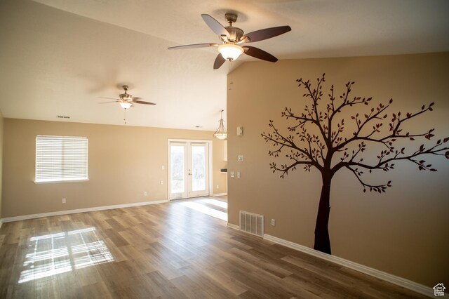 1409 S 30 E, Payson, UT 84651 - empty room with a ceiling fan, visible vents, wood finished floors, and lofted ceiling