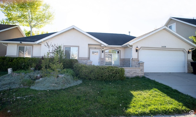 single story home featuring a front lawn, stone siding, a garage, stucco siding, and concrete driveway