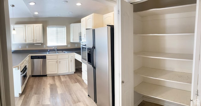 1409 S 30 E, Payson, UT 84651 - kitchen featuring recessed lighting, white cabinets, a sink, light wood finished floors, and appliances with stainless steel finishes