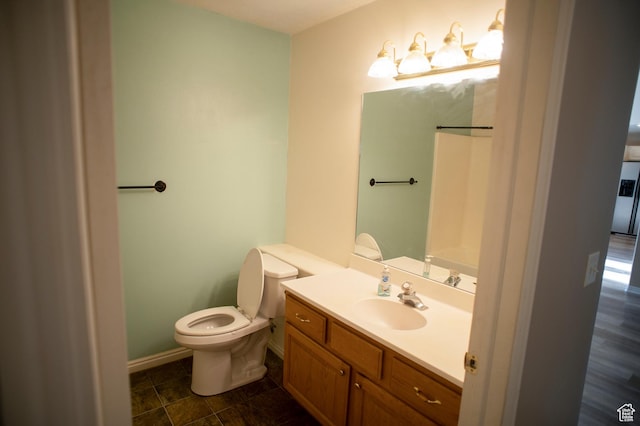 1409 S 30 E, Payson, UT 84651 - bathroom with vanity, baseboards, and toilet