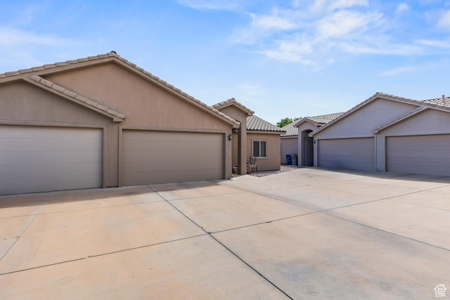 502 N 2480 W, Hurricane, UT 84737 - single story home featuring an attached garage, stucco siding, a tiled roof, and concrete driveway
