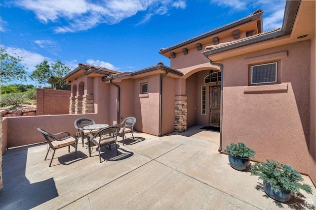305 E 350 N, Ivins, UT 84738 - view of patio featuring outdoor dining area and fence