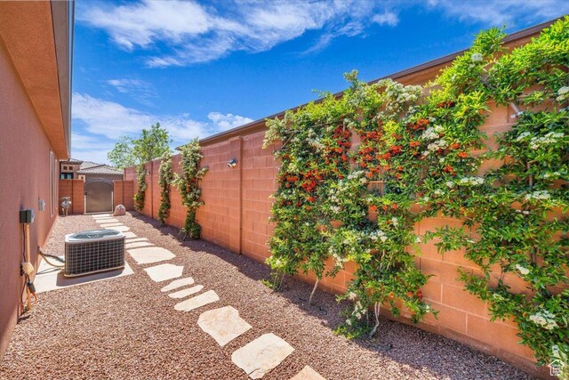 305 E 350 N, Ivins, UT 84738 - view of yard featuring a fenced backyard and central AC