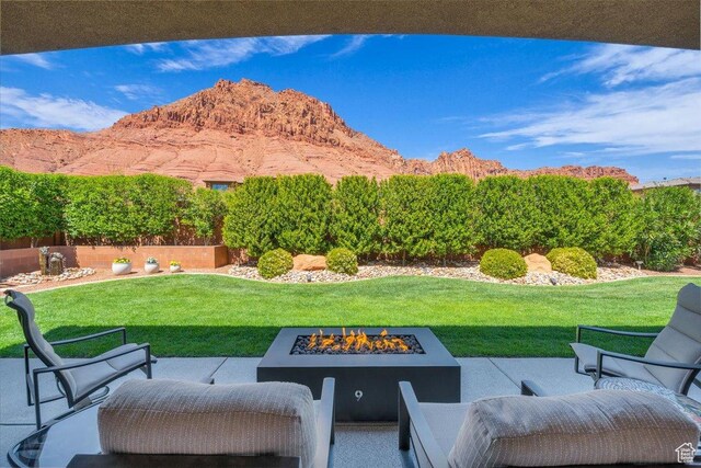 305 E 350 N, Ivins, UT 84738 - view of patio / terrace with a fire pit and a mountain view