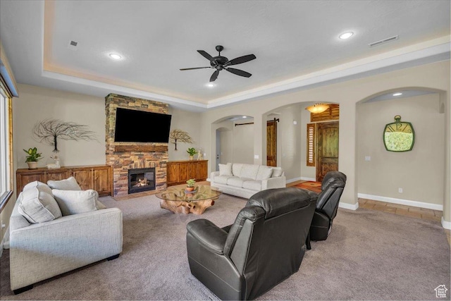 305 E 350 N, Ivins, UT 84738 - carpeted living room with recessed lighting, arched walkways, a ceiling fan, and a tray ceiling