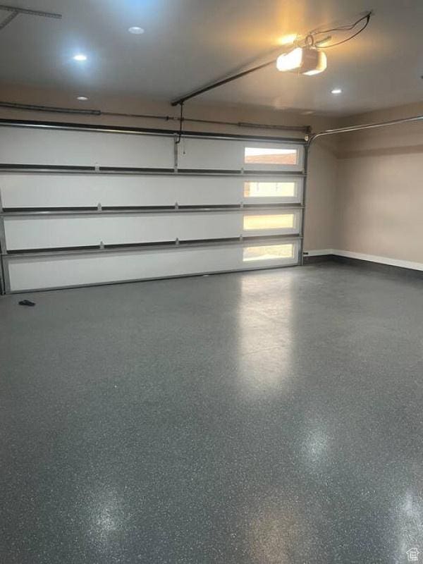 17 Tangren Cir, Moab, UT 84532 - garage featuring baseboards and a garage door opener