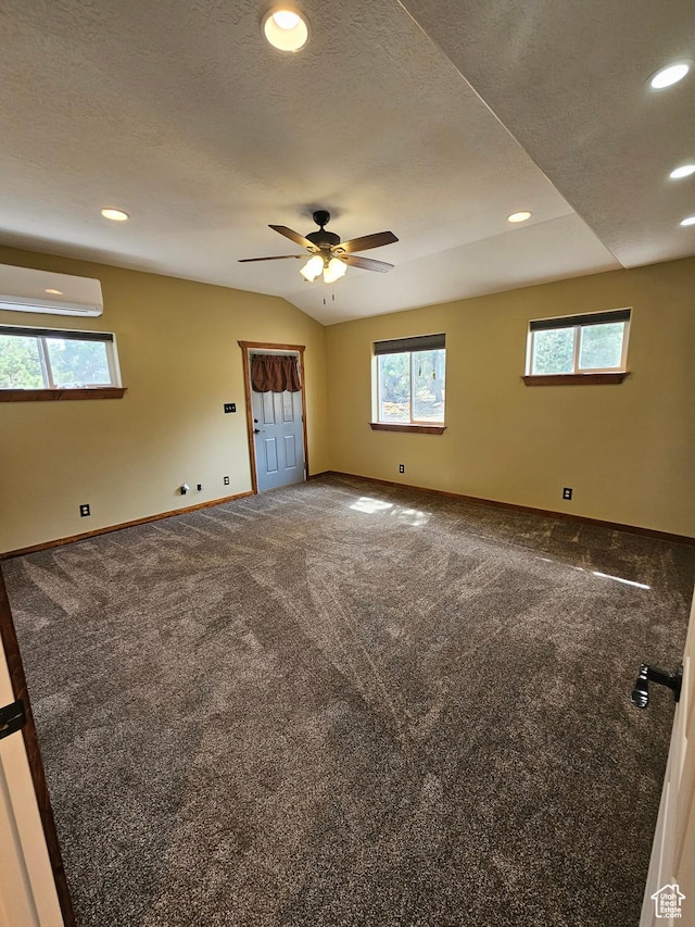 33383 W 8000 S, Duchesne, UT 84021 - carpeted spare room featuring a wall mounted air conditioner, healthy amount of natural light, ceiling fan, recessed lighting, and baseboards
